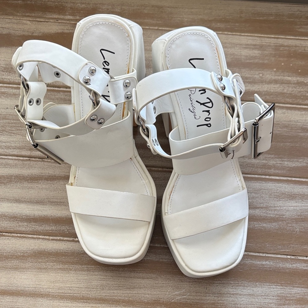 Lemon Drop white sandals with buckles